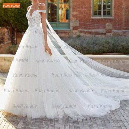 Charming White Wedding Dresses 2021 Bride Gowns Spaghetti Straps Tulle Applique vestido de noiva Illusion Layered robe de mariée