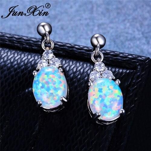 JUNXIN Oval Cut Blue White Fire Opal Earrings For Women Rainbow Birthstone Stud Earrings Female CZ White Gold Wedding Jewelry