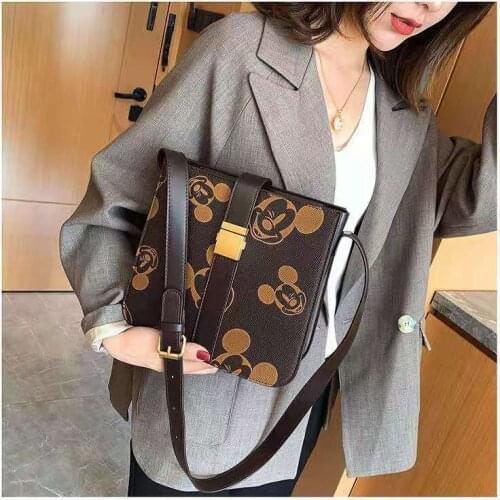 Disney cartoon Mickey 2021 new ladies PU printing bucket bag large capacity versatile one-shoulder messenger portable travel bag