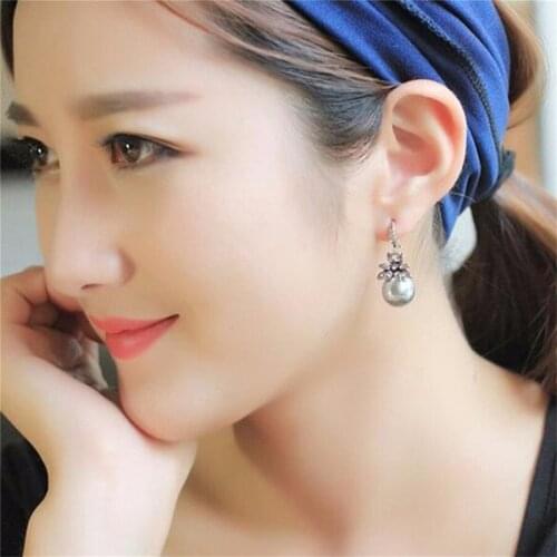 Qianraq Delicate Pearl Earrings Sun Flower with Rhinestones Earrings Ladies Party Jewelry Gifts Imitate Pearl Crystal Dangle Ear