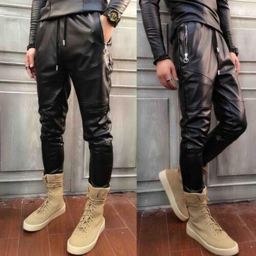 HOT Male PU low crotch leather pants 2020 autumn and winter new Men slim Korean feet pants hip hop harem pants Stage costume