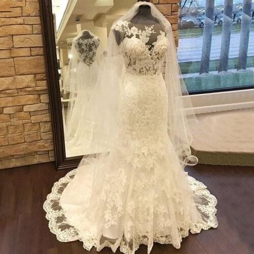 Sexy Summer Mermaid Wedding Dresses 2019 Cheap Beach Garden Illusion Sheer Neck Lace Appliques Court Train Merry Bridal Gowns