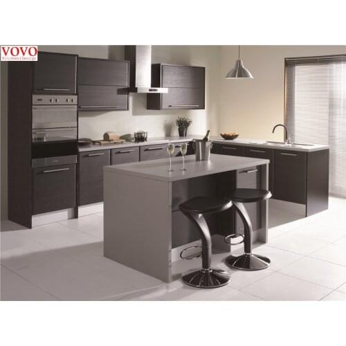 Grey lacquer kitchen cabinet with waterfall island