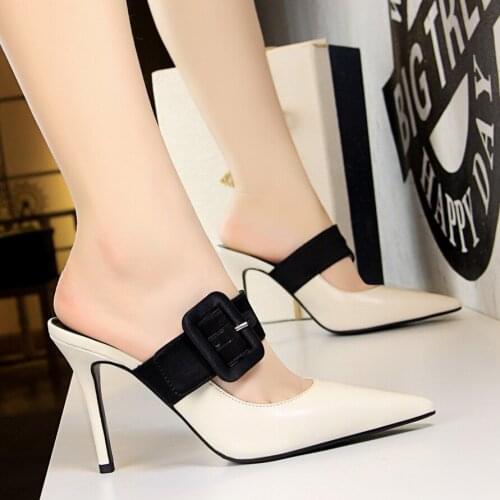 Stylish and simple slippers with elongated thin heels, high heels, and shallow pointed toe with belt buckle