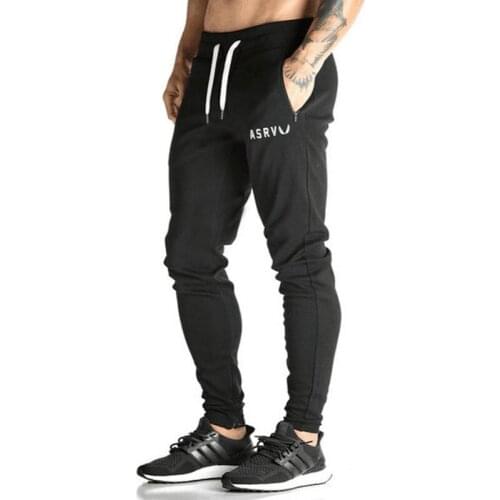 NEW 2021 Spring Autumn Casual Hip Hop Harem Pants Elastic Waist Drawstring Letter Printed Muscle Fitness Trousers Men