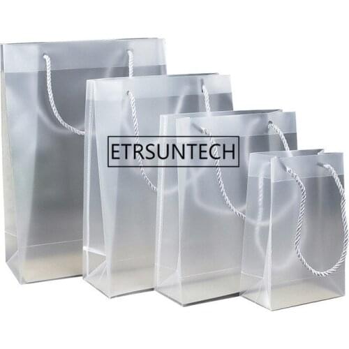 100pcs/lot creative pp plastic gift packaging bags with handle wedding party favors bags portable plastic transparent gift bags