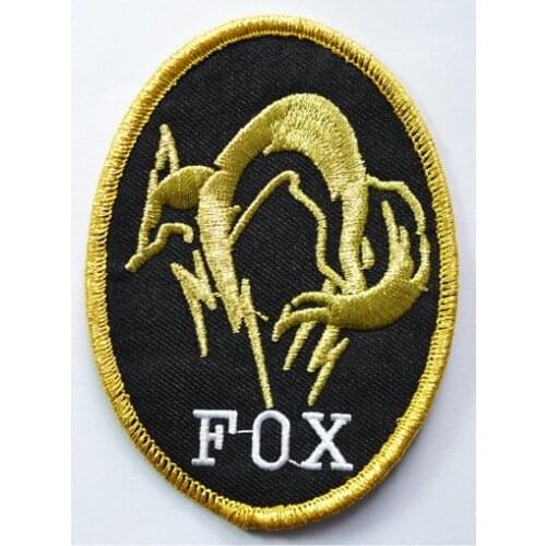 Golden METAL GEAR SOLID FOX HOUND LOGO BADGE COSPLAY BLACK OPS HI VIZ IRON ON PATCH (size is about 6.5 * 9 cm)