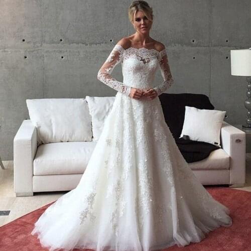 2020 Romantic A Line Wedding Dresses Boat Neck Off Shoulder Wedding Gowns Lace Long Sleeve Beaded Bridal Gowns Custom Made