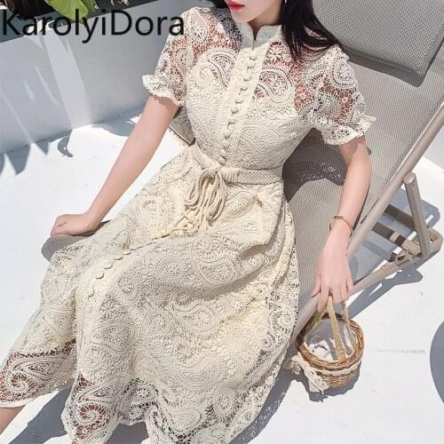 Summer Women Stand Collar Lantern Short Sleeve Bandage Dress Runway Crochet Hollow Out Lace Dress Female Sash Belt Long Dress