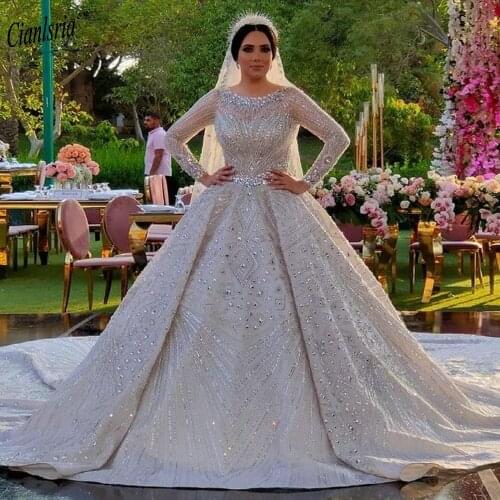 Luxurious Long Sleeve Pearls Chapel Train Ball Gown Wedding Dress Dubai Arabic Beading Crystal Illusion Back Bridal Gown
