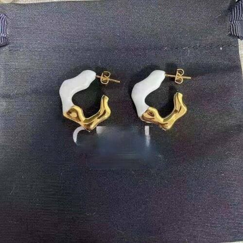 Wavy shape irregularly set pearl drop glaze hit color design sense earrings European and American metal earrings