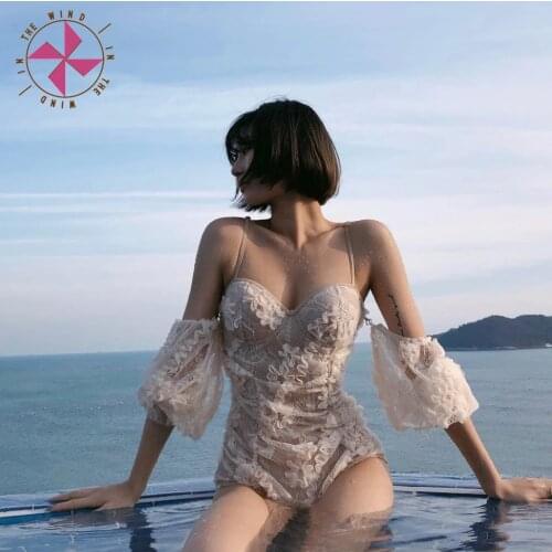 In The Wind Sexy Lace Swimwear Women Solid Swimwear Push Up Swimsuit White Monokini Long Sleeve Pad Bathing Suit Open Back Beach
