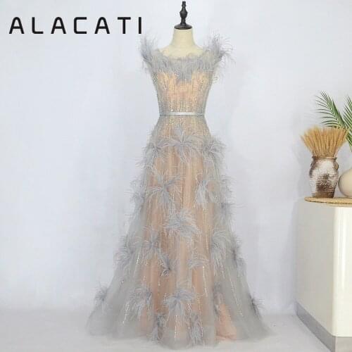High-end luxury romantic feather crystal evening dress exports Middle East Dubai sexy word shoulder long evening dress real phot