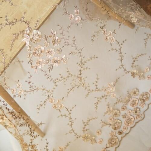 Gold series three-dimensional relief embroidery fabric large positioning flower soft mesh tissu High end dress wedding material