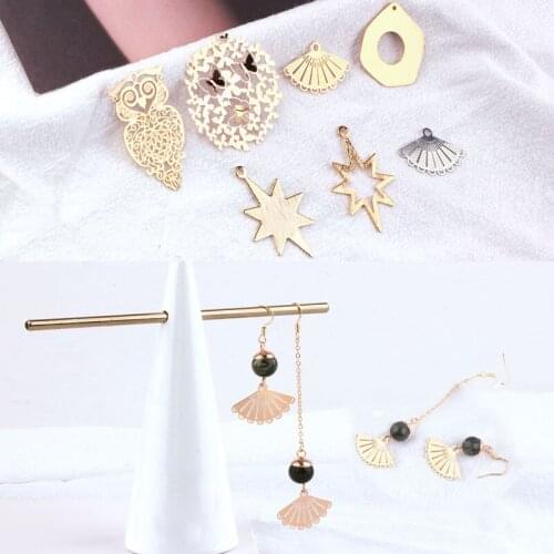 The copper plating gold fan hollow owl jewelry material DIY bracelet pendant earrings earrings accessories