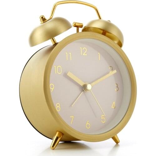 ET)ERAL Travelers simplicity retro alarm clock. Stainless steel electroplate golden. Very beautiful bedside cabinet furnishing