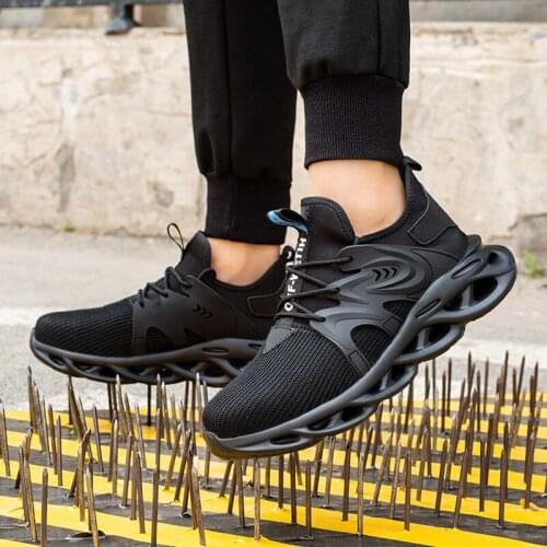 Men and women with the model of solid steel toe cap puncture proof shoes, safety work shoes, lightweight breathable sneaker