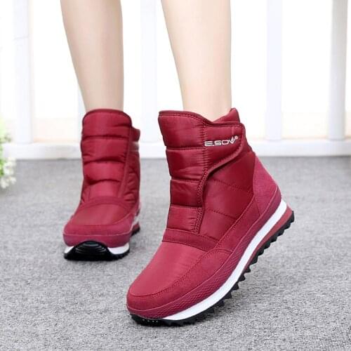 Winter new plus velvet warm waterproof female short tube Snow boots low-top flat comfortable non-slip cotton shoes outdoor short