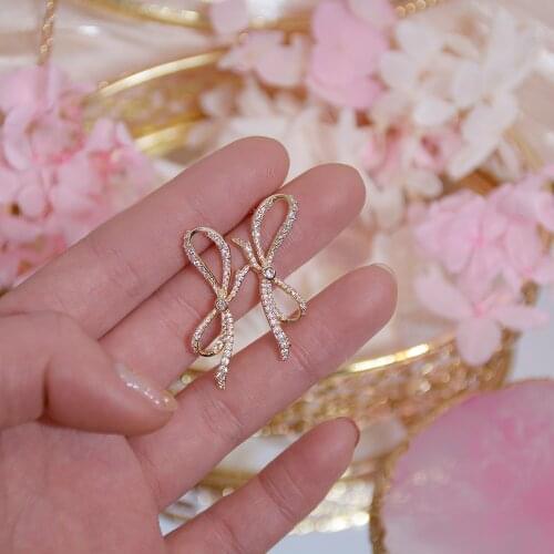 Xinbada Fashion Jewelry S925 Silver Needle Micro Inlaid Zircon Bow Earrings for Woman Shine Holiday Party Simple Earring