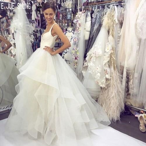 E JUE SHUNG Newest A Line Wedding Dresses Spaghetti Straps Backless 2020 Fashion Tiered Ruffles Bridal Gowns vestido de noiva