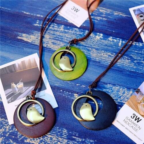 70% Hot Sell Women Ethnic Cute Bird Hollow Wooden Circle Pendant Sweater Necklace Jewelry