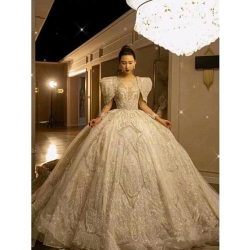 2021 New Dubai Big Ball Gown Wedding Dresses Long Sleeves Arabic Style Ruffles With Sequins Appliques Long Bridal Wedding Gown