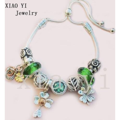 XIAOYI 2020 New 100% S925 Green flower coloured glaze insect love leaf cat eye wheat ear suitable for European pull bracelet