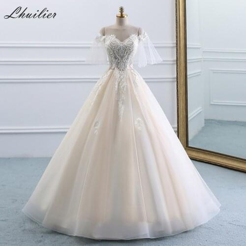 Lhuilier A-line Floor Length Tulle Wedding Dresses 2020 Boat Neck Lace Appliques Sweep Train Half Sleeves Bridal Dress