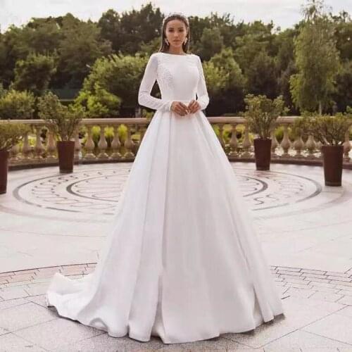 Elegant Satin Wedding Dresses Long Sleeve Lace Appliqué Bride Gown Muslim Wedding Gown Covered Back Vestido de novia 2021