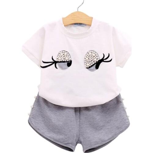 Free shipping summer baby girl clothes new fashion baby clothing eyebrow cartoon lovely suit short sleeves+Short pants