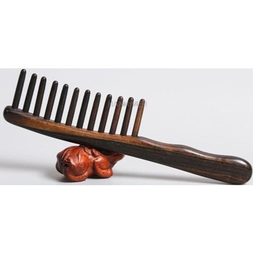 Horn sandalwood comb Shen Guibao tooth shaper massage comb goes deep into the scalp to clean up dandruff and pass the comb