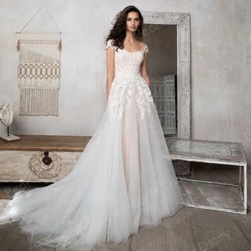 Charming Sheer O-neck Wedding Gowns 2021 Cap Sleeve Sweep Train Lace Applique Bridal Dresses Custom Bride Dress Vestido De Noiva