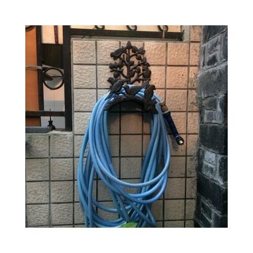Wall Mounted Cast Iron Garden Hose Hanger Rack with Bird Ornament and Tree Branch Design