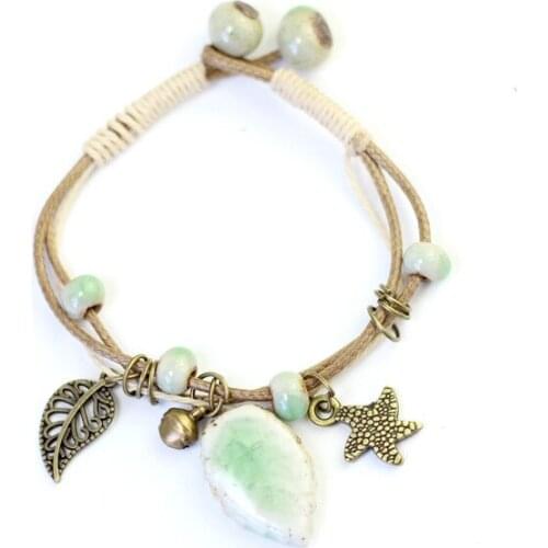 12 Pieces/Lot Ceramic Bracelet Antique Gold Color Starfish Bell Charm Hollow Leaf Beads Multilayer Rope Wristband Women Jewelry