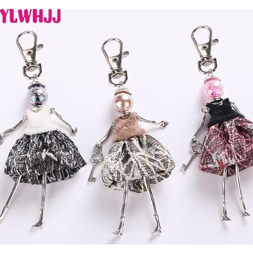 YLWHJJ brand new car doll keychain women Handmade black White Color dress pendant bag key chains girls key ring fashion jewelry