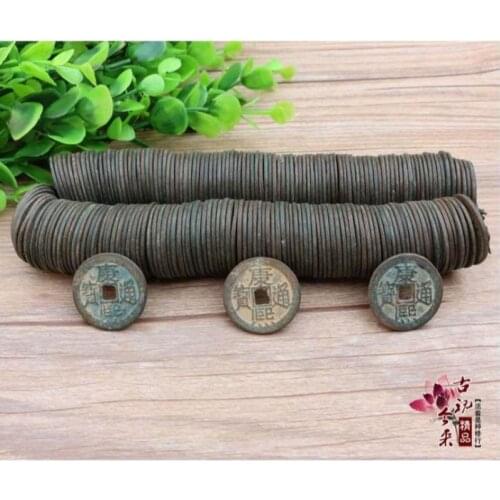 100 bronze coins and a string of Kangxi Tongbao from rural China