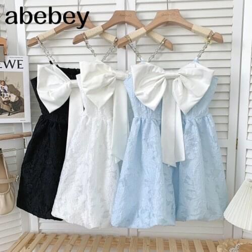 Elegant sleeveless off shoulder Dress bow decoration diamond chain high waist pleated short strap Dress 2021 New Summer