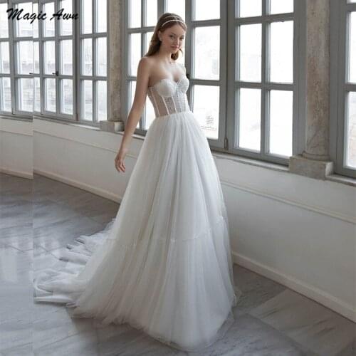 Magic Awn Sweetheart Princess Beach Wedding Dresses Pearls Beaded Lace Appliques Illusion Boho Bridal Gowns A-Line Lace Up Back
