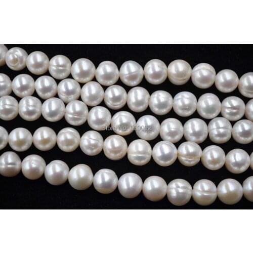 Wholesale 11mm natural white freshwater cultured pearl strands