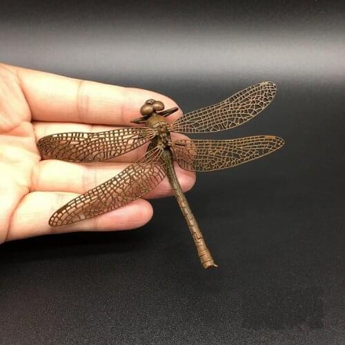 Delicate and lovely (dragonfly) make old bronze figurines imitating antique