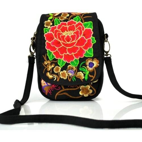 Yunnan ethnic wind clamshell embroidery embroidery mini bag mobile phone package characteristics
