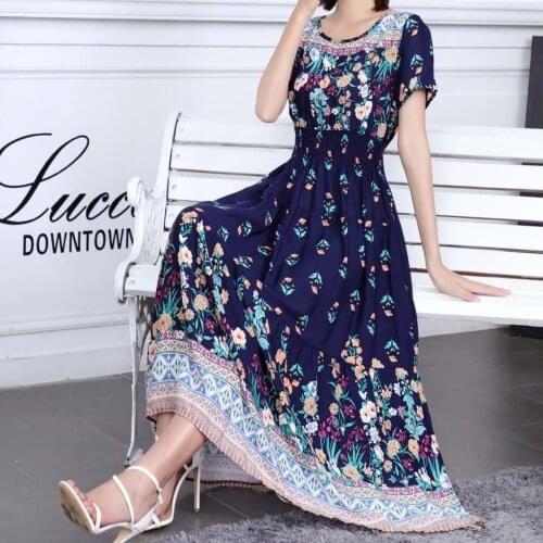 Cotton silk floral dress female seaside vacation beach long skirt was thin and big swing short sleeve skirt