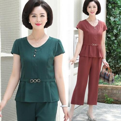 2020 Solid color all-match comfortable casual womens two-piece set summer new short-sleeved shirt + nine pants sweat suits