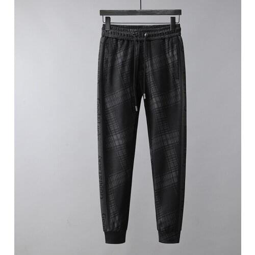 Mens Casual Pants Men 2021 Spring New Streetwear Solid Color Trousers Fashion Black Joggers Loose Trousers Pencil Pants For Men