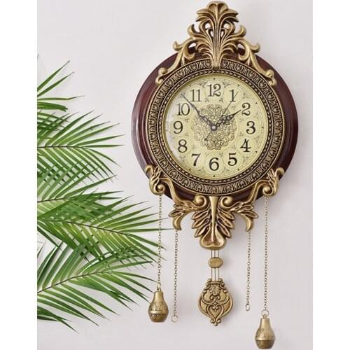 Creative solid wood silent clock European and American Quartz Clock Fashionable Simple Living Room Wall Clock