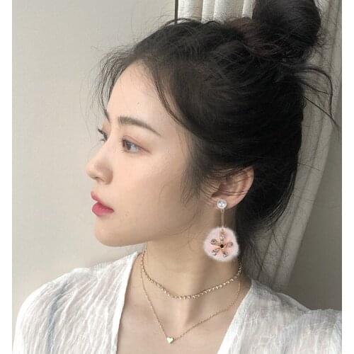 Autumn and winter new trend earrings female long tassel asymmetric earrings Korean version of exaggerated flower earrings