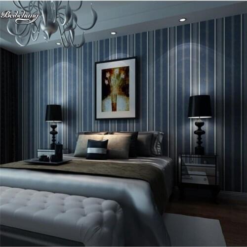 Beibehang Modern simple dark blue vertical striped nonwoven fabric wallpaper living room TV wall wallpaper nostalgia