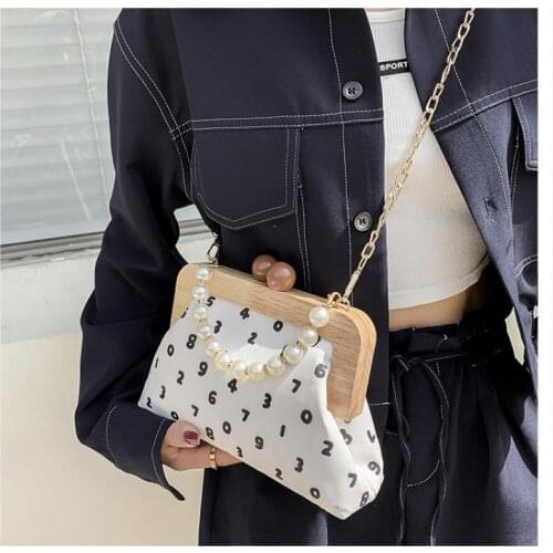 Fashion Women Shell Wood Clip PU Shoulder Crossbody Bag Pearl Chain Small Handbags 2021 New Womens Casual Top-Handle Bag Purses
