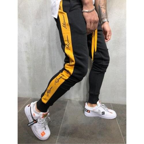 2021 New Mens Fitness Trousers Outdoor Sports Casual Pants Fashion Running Slim Trousers
