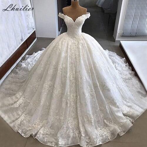 Lhuilier Ball Gown Boat Neck Tulle Wedding Dresses 2020 Floor Length Off the Shoulder Beaded Appliques Chapel Train Bridal Dress